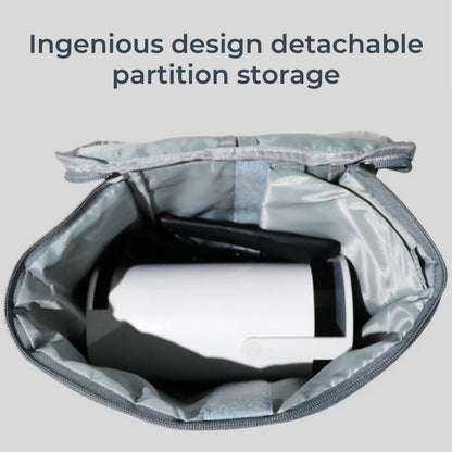 A grey zippered storage bag open to show a soft interior with velcro-fastened detachable partitions holding a white cylindrical device and black cable